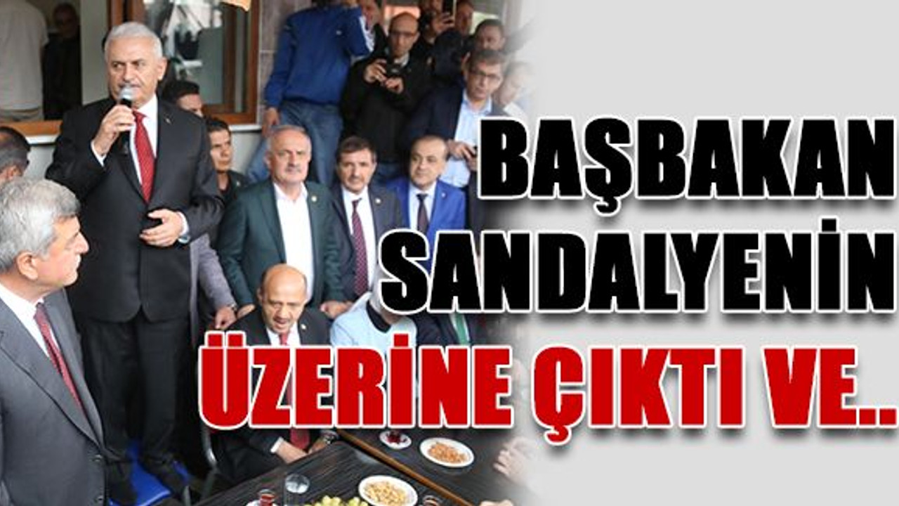 Başbakan sandalyenin üzerine çıktı ve..