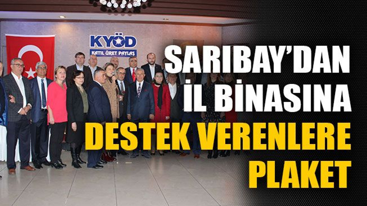 Sarıbay’dan il binasına destek verenlere plaket