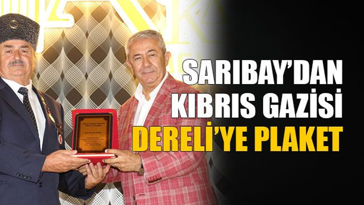 Sarıbay’dan Kıbrıs Gazisi Dereli’ye plaket