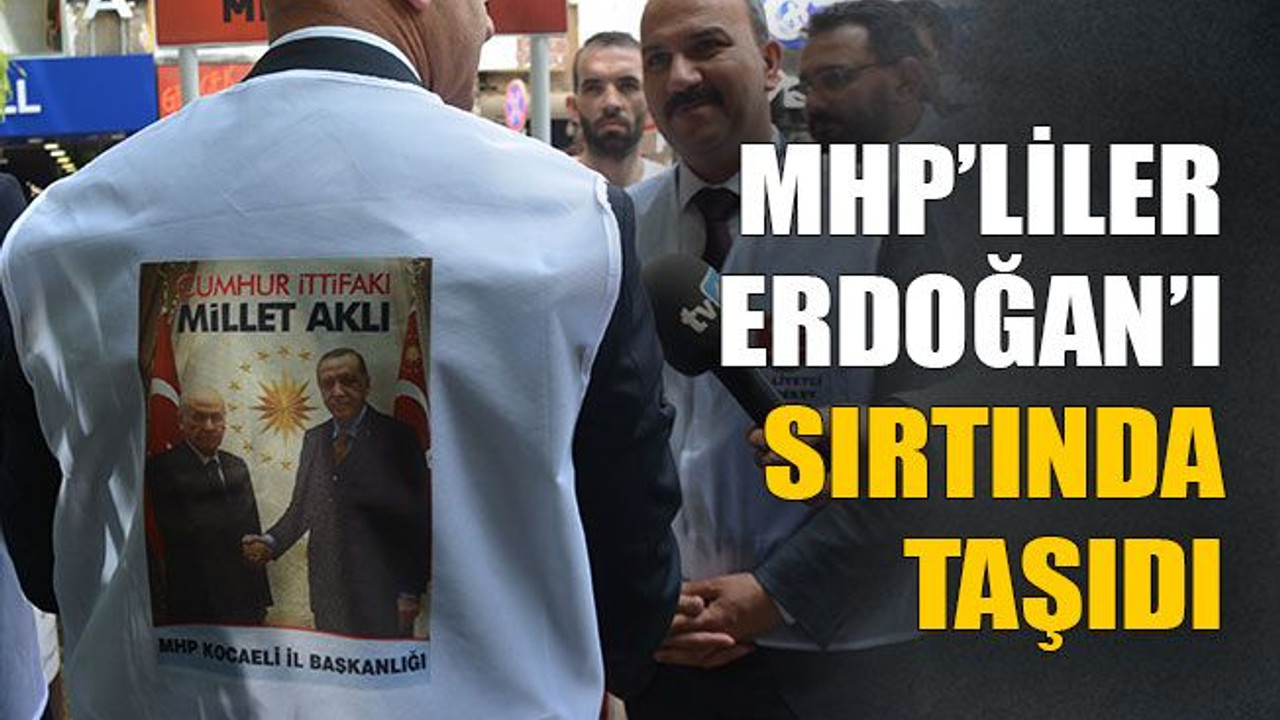 MHP’liler Erdoğan’ı sırtında taşıdı