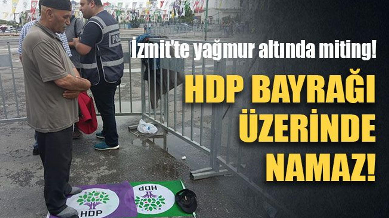 HDP’den yağmur altında miting! HDP bayrağı üzerinde namaz!