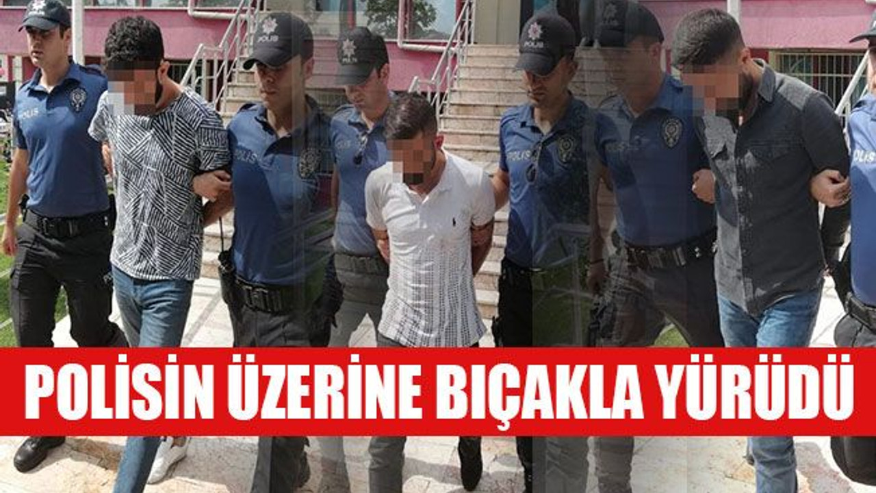 Kavgayı ayırmaya gelen polislerin üzerine bıçakla yürüdü