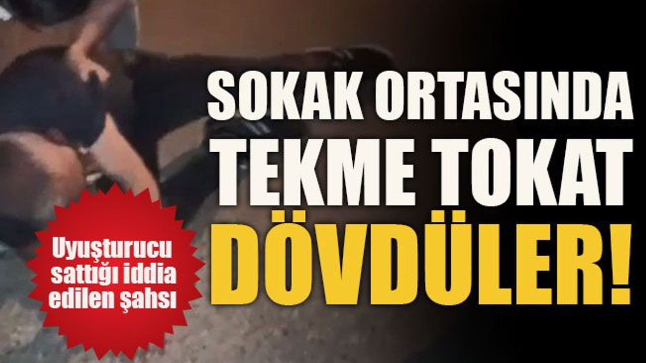 Uyuşturucu sattığı iddia edilen şahsı... Sokak ortasında tekme tokat dövdüler!