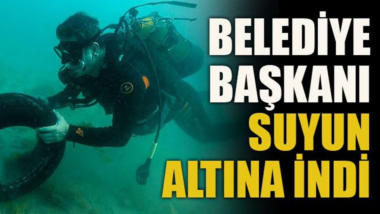 Belediye başkanı suyun altına indi