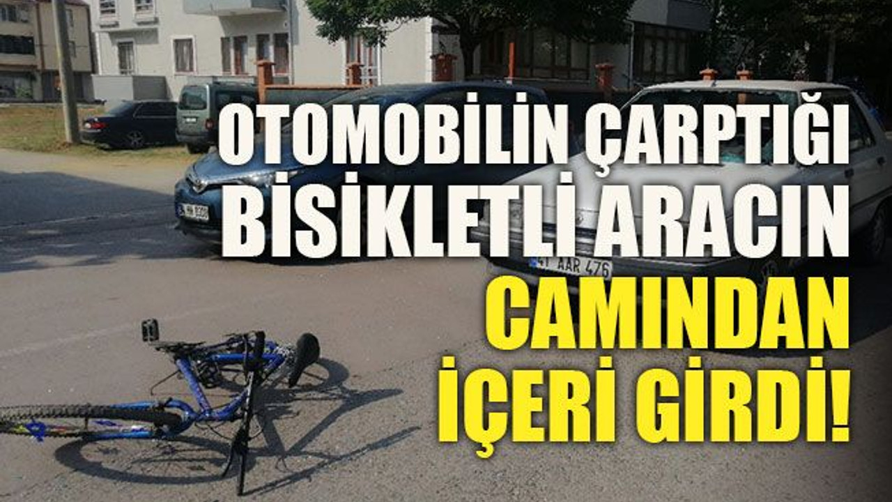 Otomobilin çarptığı bisikletli aracın camından içeri girdi!