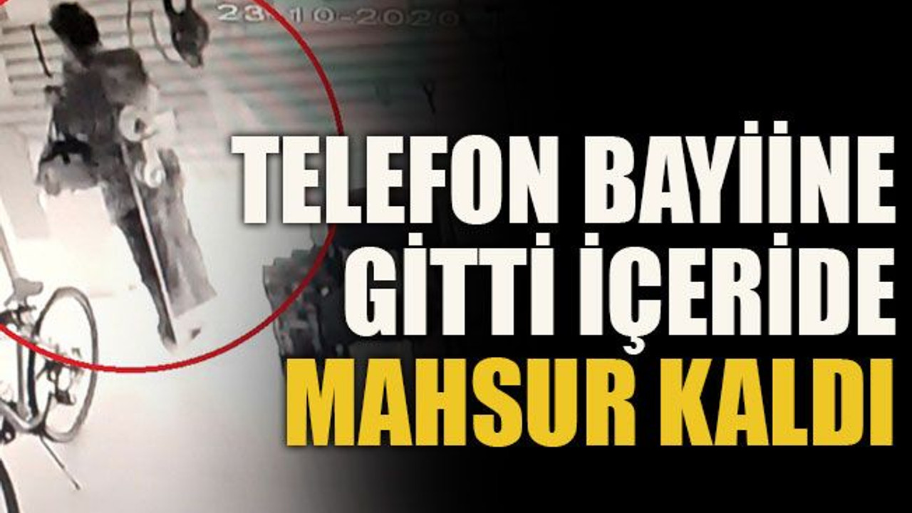 Telefon bayiine gitti içeride mahsur kaldı