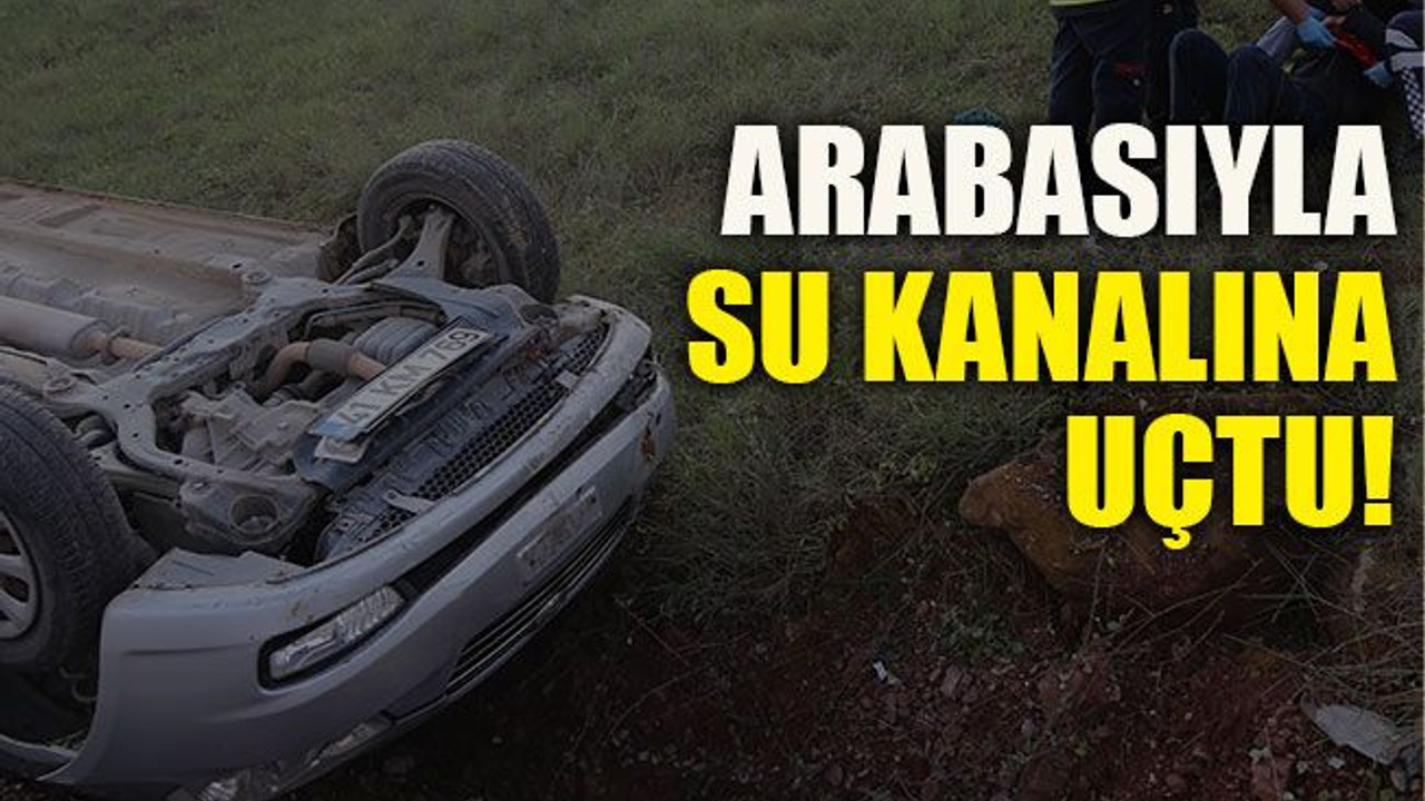 Arabasıyla su kanalına düştü!