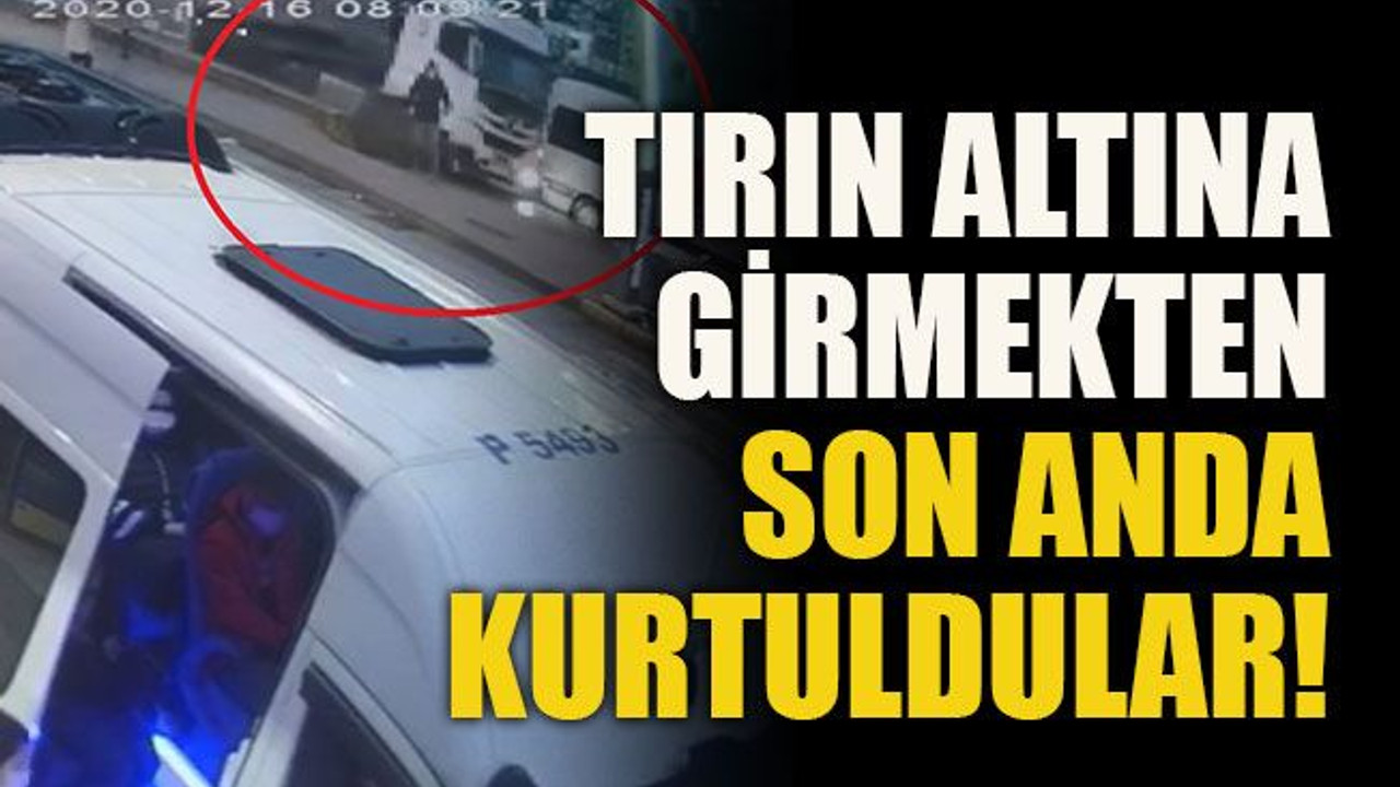 Tırın altına girmekten son anda kurtuldular!