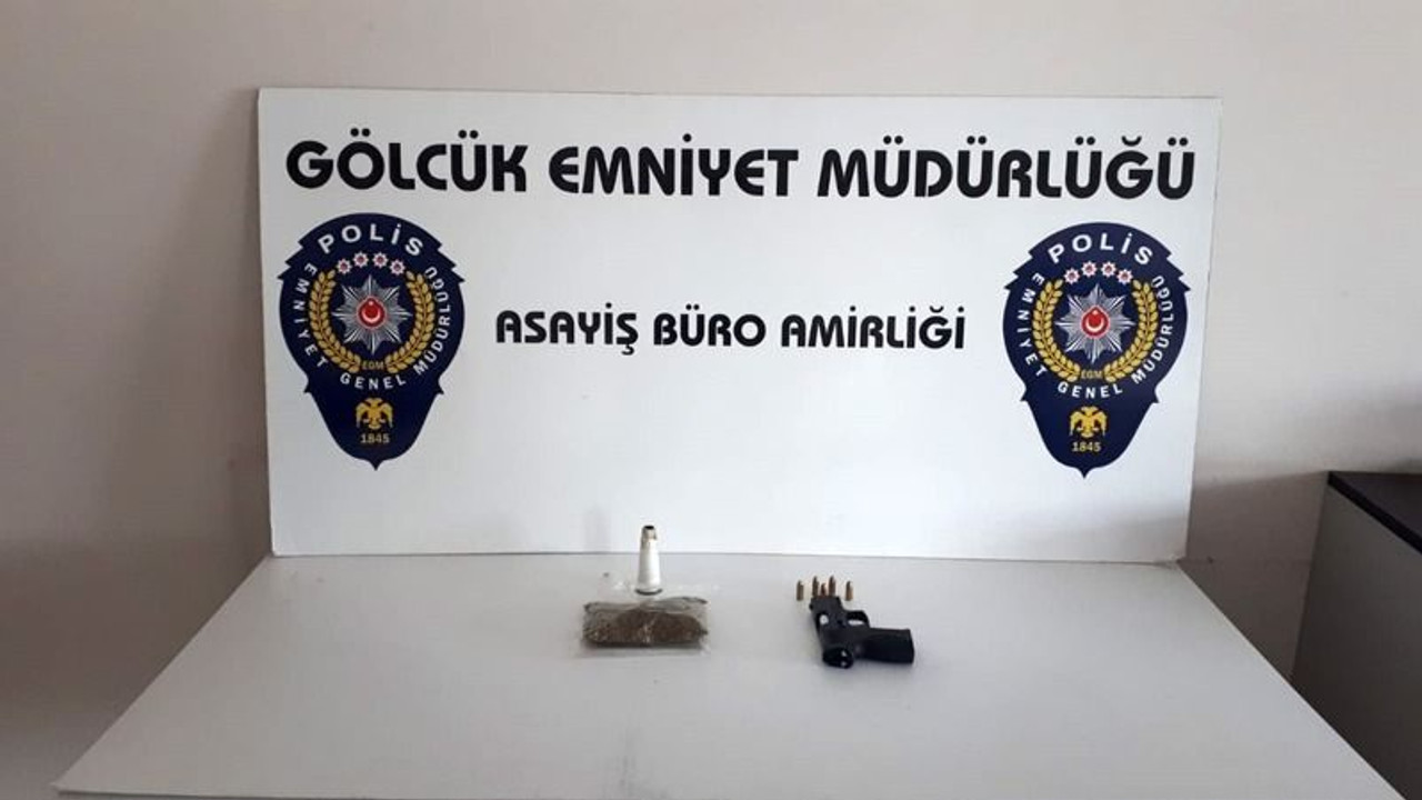 Uyuşturucu ve silahla gezerken bekçilere yakalandı