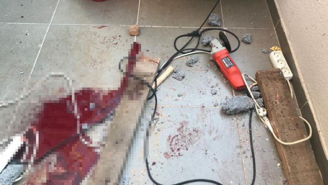 Balkondaki demir parmaklıkları keserken canından oluyordu