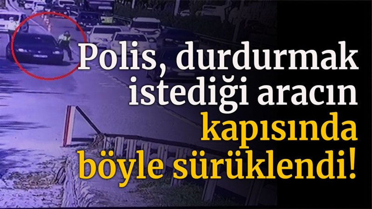 Polis, durdurmak istediği aracın kapısında böyle sürüklendi!