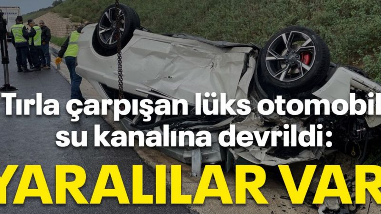 Tırla çarpışan lüks otomobil su kanalına devrildi: Yaralılar var!