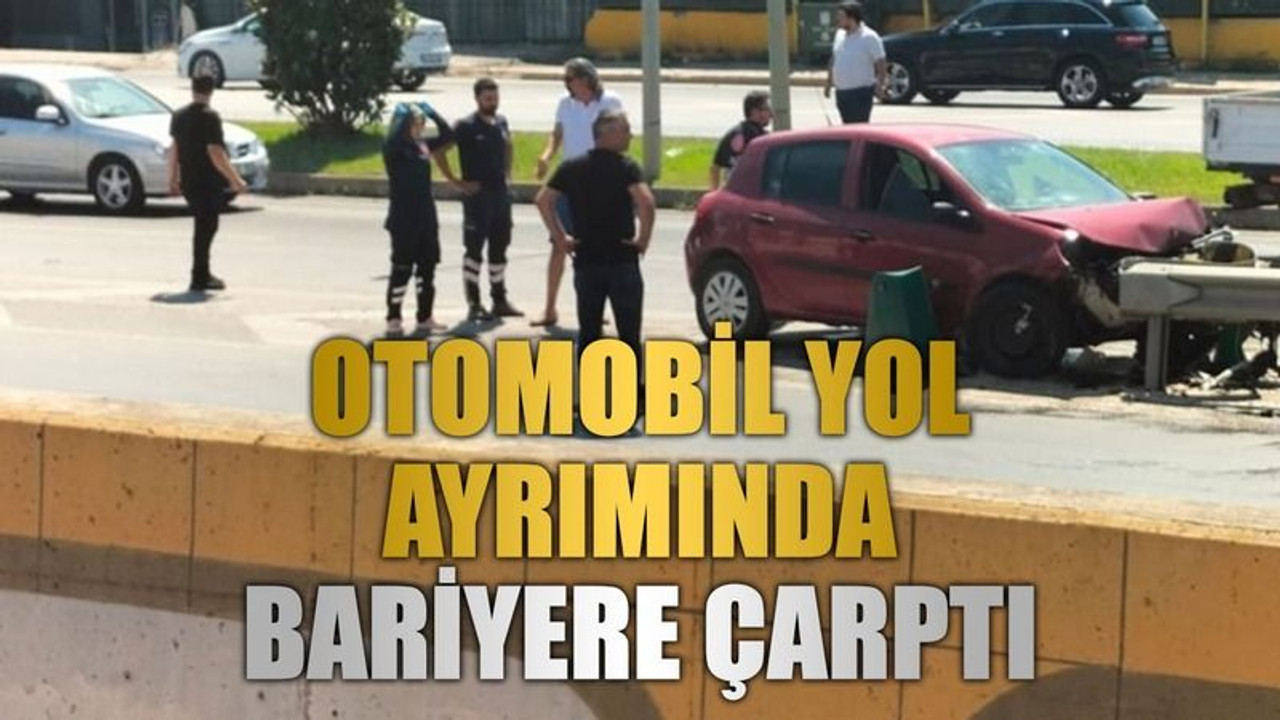Otomobil yol ayrımında bariyere çarptı