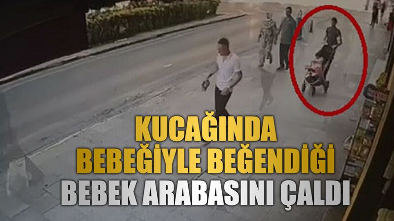 Kucağında bebeğiyle beğendiği bebek arabasını çaldı