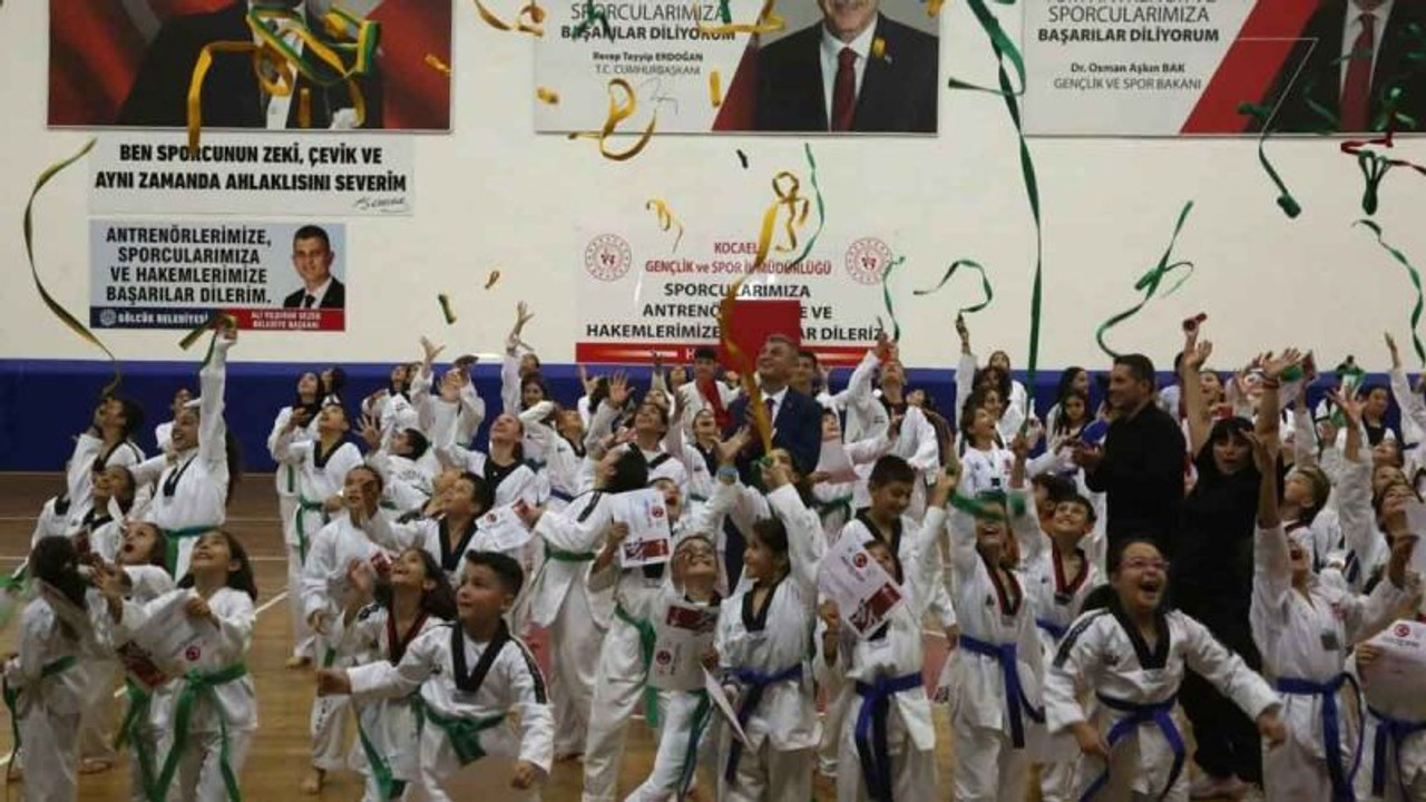 330 sporcu kuşak atladı