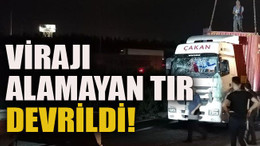 Virajı alamayan TIR devrildi!