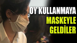 Oy kullanmaya maskeyle geldiler