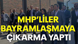 MHP’liler bayramlaşmaya çıkarma yaptı