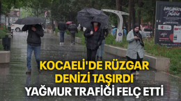 Kocaeli'de rüzgar denizi taşırdı, yağmur trafiği felç etti