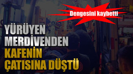 Yürüyen merdivenden kafenin çatısına düştü