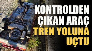Kontrolden çıkan araç tren yoluna uçtu!