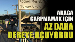 Araca çarpmamak için az daha dereye uçuyordu