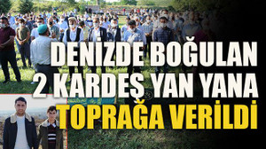 Denizde boğulan 2 kardeş yan yana toprağa verildi