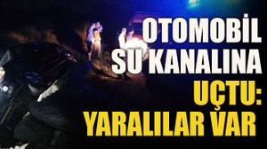 Otomobil su kanalına uçtu: Yaralılar var