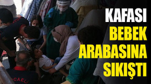 Çocuğun kafası bebek arabasına sıkıştı
