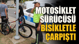 Motosiklet sürücüsü bisikletle çarpıştı