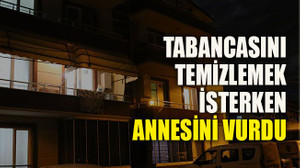 Tabancasını temizlemek isterken annesini vurdu