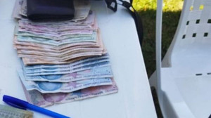 Para dolu çanta sahibine ulaştırıldı