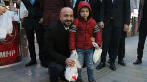 MHP’liler kandil simidi dağıttı