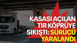 Kasası açılan tır köprüye sıkıştı: Sürücü yaralandı