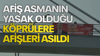 Afiş asmanın yasak olduğu köprülere afişleri asıldı