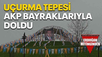 Uçurma tepesi AKP bayraklarıyla doldu