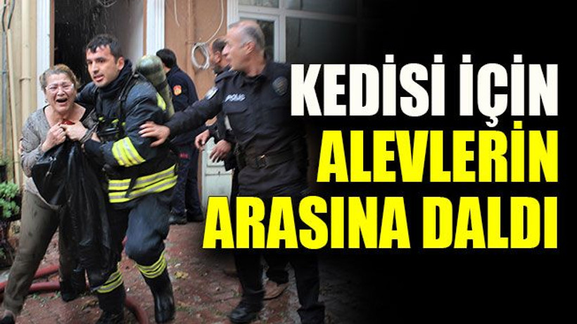 Kedisi için alevlerin arasına daldı