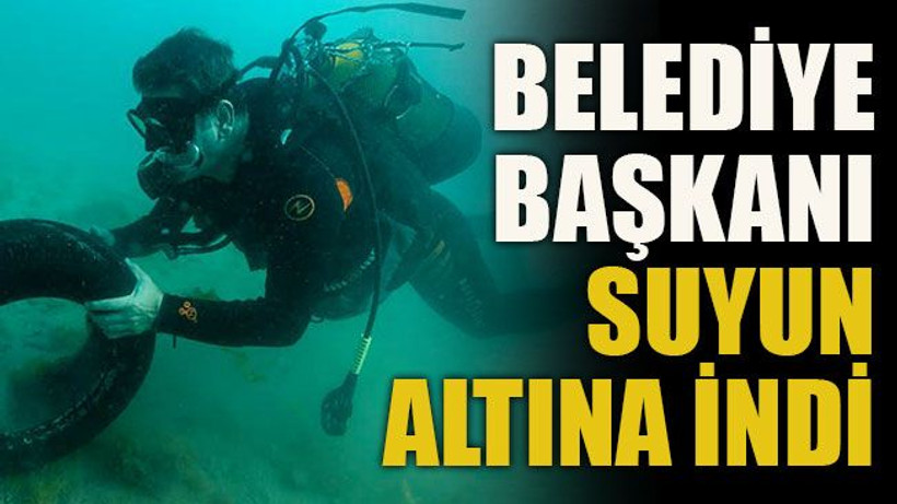Belediye başkanı suyun altına indi