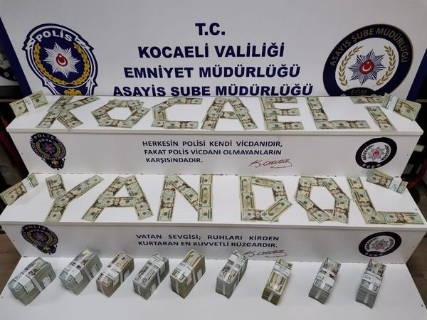 Dolandırıcı 700 bin doları çektirdi, parayı alacağı an suçüstü yakalandı