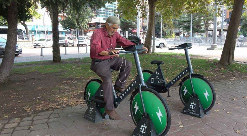 Hem spor yap hem telefonunu şarj et