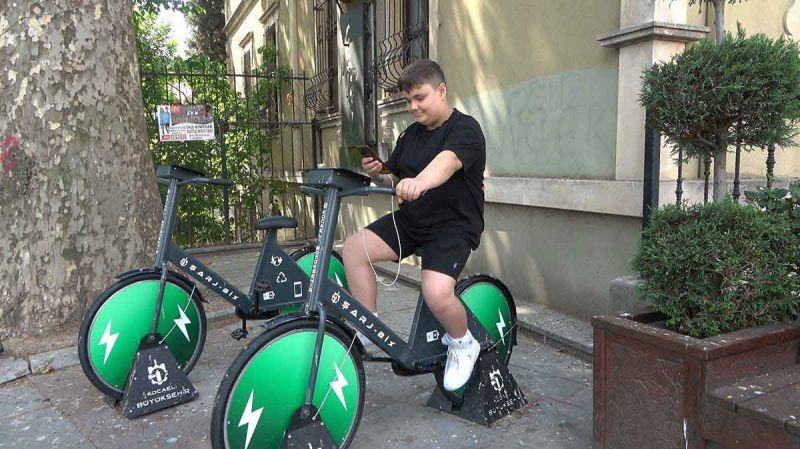 Hem spor yap hem telefonunu şarj et